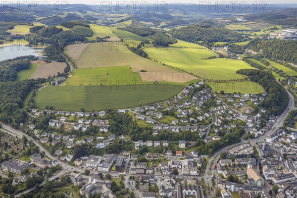 Aerial view, town view, Meschede, planned building area near Langelohweg, Sauerland, Hochsauerlandkreis, North Rhine-Westphalia, Germany, building area, mountains and valleys, city, DE, Europe, radio tower, property tax, hilly landscape, real estate, aerial view, aerial photography, aerial photography, Schröershof holiday home rental, townscape, urban area, overview, bird's eye view, wooded area, meadows and fields, residential area, living and life, residential area, quality of life, bird's eye view, overview