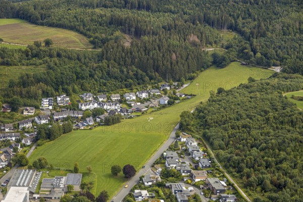 Aerial view, grammar school of the city of Meschede, meadow area Schederweg, planned building area near Menzelweg, Meschede, Sauerland, Hochsauerlandkreis, North Rhine-Westphalia, Germany, building area, building site, building plots, building project, education, educational institution, DE, Europe, property tax, grammar school, real estate, capacity requirements, educational institute, aerial view, aerial photography, aerial photography, Mescheder Höhenwanderweg, Schederweg, school, overview, bird's-eye view, forest area, meadows and fields, housing estate, living and life, residential area, residential buildings, residential quality, residential neighbourhood, housing estate, birds-eyes view, overview