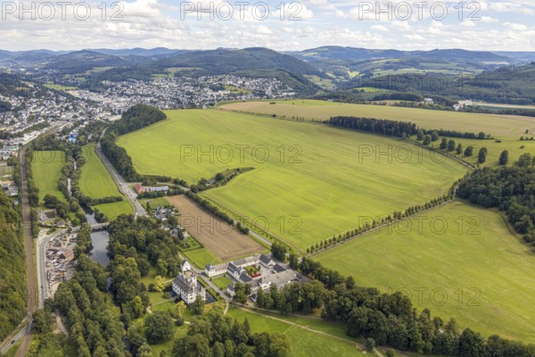 Aerial view, possible building area, Laer Castle, river Ruhr, timber trade Schulte-Albert, meadows and fields, Meschede, Sauerland, North Rhine-Westphalia, Germany, railway tracks, row of trees, mountains and valleys, Berghauser Weg, view to Meschede, bridge, castle, DE, Europe, distant view, commercial enterprises, commercial area, commercial location, commercial use, indoor and outdoor swimming pool Meschede, manor house, manor house, manor building, Hochsauerlandkreis, hilly landscape, industrial site, Laer, aerial view, aerial photography, aerial photography, Ruhrbrücke Arnsberger Straße, castle, overview, bird's-eye view, forest area, moated castle, moated castle, birds-eyes view, overview