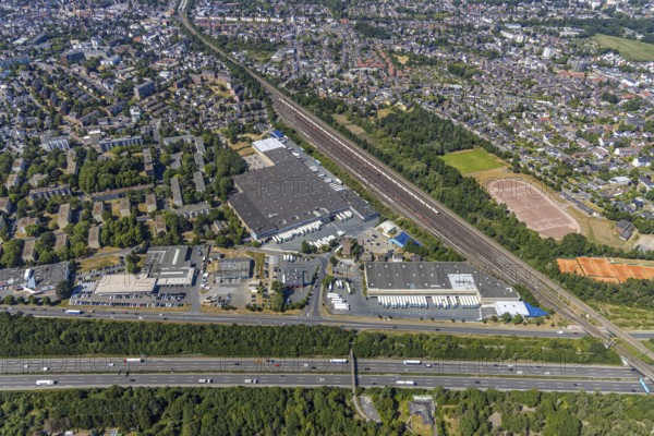 Aerial view, motorway A40, Venloher Straße, Ruhrorter Straße, EDEKA Frischecenter Mörs, logistics centre, trucks on car park, Asberg, Mörs, Ruhr area, North Rhine-Westphalia, Germany, DE, Europe, birds-eyes, view, aerial photography, aerial photography, overview, overview, bird's eye view, transport, traffic, infrastructure, logistics, road traffic, goods, goods movement, supply, consumption