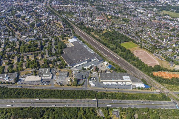 Aerial view, motorway A40, Venloher Straße, Ruhrorter Straße, EDEKA Frischecenter Mörs, logistics centre, trucks on car park, Asberg, Mörs, Ruhr area, North Rhine-Westphalia, Germany, DE, Europe, birds-eyes, view, aerial photography, aerial photography, overview, overview, bird's eye view, transport, traffic, infrastructure, logistics, road traffic, goods, goods movement, supply, consumption