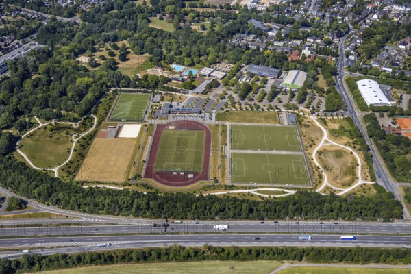 Aerial view, motorway junction 8 Mörs, motorway A40, Mörser TV Hockey, TPM Tennis-Park Mörs, Mörs, Ruhr area, North Rhine-Westphalia, Germany, DE, Europe, birds-eyes, view, aerial photography, aerial photography, overview, overview, bird's eye view, transport, traffic, infrastructure, logistics, road traffic, hobby, sport, training, team, championship, clay court, tennis, tennis playing, tennis club, hockey, fitness, hockey court