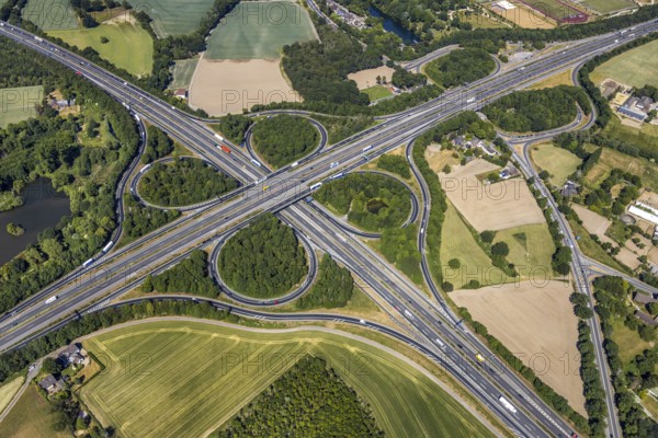 Aerial view, motorway junction Mörs, motorway A40 A57, Bettenkamp, Mörs, Ruhr area, North Rhine-Westphalia, Germany, DE, Europe, birds-eyes, view, aerial photography, aerial photography, overview, bird's eye view, transport, traffic, infrastructure, logistics, road traffic