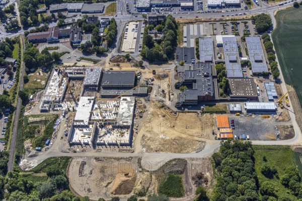 Aerial photo, Berufskolleg für Technik Mörs, construction site of new school building, vocational college campus, joint campus of the vocational college for technology, the Hermann-Gmeiner vocational college, the Mercator vocational college and the specialised seminar for geriatric care, Mörs, Ruhr area, North Rhine-Westphalia, Germany, DE, Europe, birds-eyes, view, aerial photograph, aerial photography, aerial photography, overview, overview, bird's eye view, vocational school, training, profession, apprenticeship, technical college