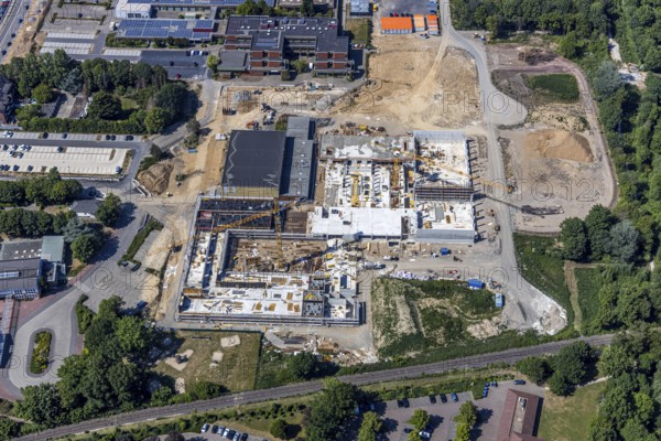 Aerial view, Berufskolleg für Technik Mörs, construction site of new school building, Berufskolleg-Campus, joint campus of the Berufskolleg für Technik, the Hermann-Gmeiner-Berufskolleg, the Mercator-Berufskolleg and the Fachseminar für Altenpflege, Mörs, Ruhr area, North Rhine-Westphalia, Germany, DE, Europe, birds-eyes, view, aerial photograph, aerial photography, aerial photography, overview, overview, bird's-eye view, vocational school, training, profession, apprenticeship, technical school