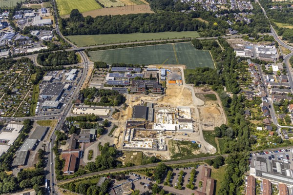 Aerial view, Berufskolleg für Technik Mörs, construction site of new school building, Berufskolleg-Campus, joint campus of the Berufskolleg für Technik, the Hermann-Gmeiner-Berufskolleg, the Mercator-Berufskolleg and the Fachseminar für Altenpflege, Mörs, Ruhr area, North Rhine-Westphalia, Germany, DE, Europe, birds-eyes, view, aerial photograph, aerial photography, aerial photography, overview, overview, bird's-eye view, vocational school, training, profession, apprenticeship, technical school