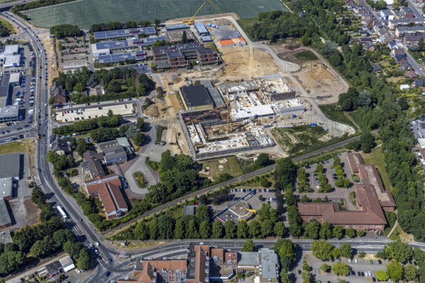 Aerial view, Berufskolleg für Technik Mörs, construction site of new school building, Berufskolleg-Campus, joint campus of the Berufskolleg für Technik, the Hermann-Gmeiner-Berufskolleg, the Mercator-Berufskolleg and the Fachseminar für Altenpflege, Mörs, Ruhr area, North Rhine-Westphalia, Germany, DE, Europe, birds-eyes, view, aerial photograph, aerial photography, aerial photography, overview, overview, bird's-eye view, vocational school, training, profession, apprenticeship, technical school