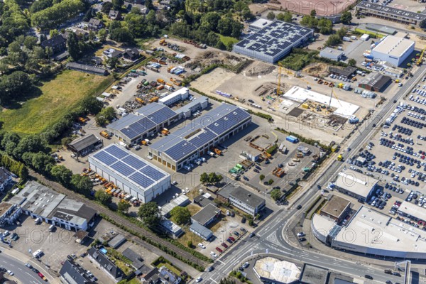 Aerial view, construction site ENNI factory and administration building, former carpenter's workshop Cleve, recycling centre, building with solar roofs, Mörs, Ruhr area, North Rhine-Westphalia, Germany, DE, Europe, birds-eyes, view, aerial photograph, aerial photography, aerial photography, overview, bird's eye view, administration building