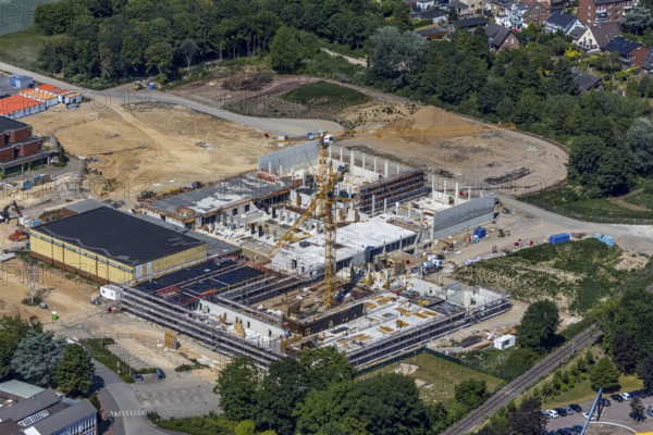 Aerial view, Berufskolleg für Technik Mörs, construction site of new school building, Berufskolleg-Campus, joint campus of the Berufskolleg für Technik, the Hermann-Gmeiner-Berufskolleg, the Mercator-Berufskolleg and the Fachseminar für Altenpflege, Mörs, Ruhr area, North Rhine-Westphalia, Germany, DE, Europe, birds-eyes, view, aerial photograph, aerial photography, aerial photography, overview, overview, bird's-eye view, vocational school, training, profession, apprenticeship, technical school