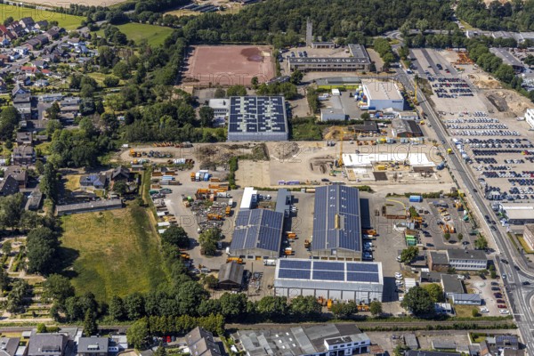 Aerial view, construction site ENNI factory and administration building, former carpentry Cleve, recycling centre, fire brigade Mörs, fire brigade Hülsdonk, building with solar roofs, Mörs, Ruhr area, North Rhine-Westphalia, Germany, DE, Europe, birds-eyes, view, aerial view, aerial photography, aerial photography, overview, bird's eye view, administration building, fire station, rescue service, fire engine, fire fighting, emergency supply