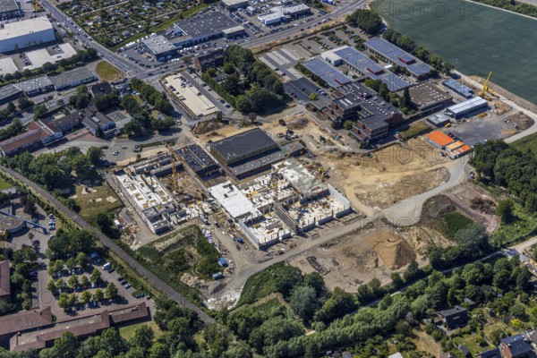 Aerial photo, Berufskolleg für Technik Mörs, construction site of new school building, vocational college campus, joint campus of the vocational college for technology, the Hermann-Gmeiner vocational college, the Mercator vocational college and the specialised seminar for geriatric care, Mörs, Ruhr area, North Rhine-Westphalia, Germany, DE, Europe, birds-eyes, view, aerial photograph, aerial photography, aerial photography, overview, overview, bird's eye view, vocational school, training, profession, apprenticeship, technical college