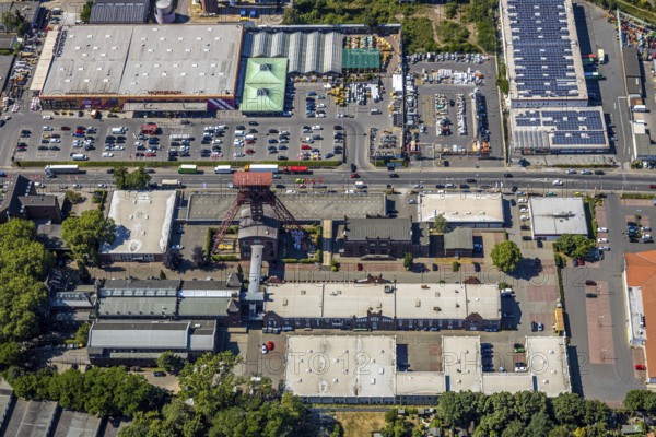 Aerial view, Former Rheinpreußen colliery, Franz-Haniel-Straße industrial estate, Hornbach DIY store, REAL supermarket, Mörs, Ruhr area, North Rhine-Westphalia, Germany, DE, Europe, birds-eyes, view, aerial photograph, aerial photography, aerial photography, overview, overview, bird's eye view, colliery, DIY store, hobby, construction, garden, construction supplies, tools, machines, industry, trade, business, commercial enterprise, production, trade, shopping, food