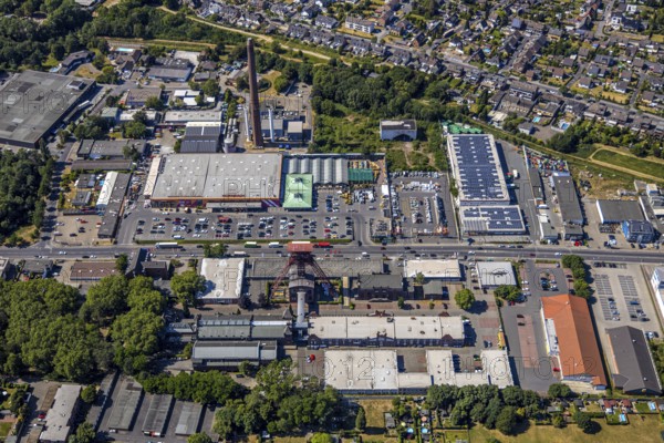 Aerial view, Former Rheinpreußen colliery, Franz-Haniel-Straße industrial estate, Hornbach DIY store, REAL supermarket, Mörs, Ruhr area, North Rhine-Westphalia, Germany, DE, Europe, birds-eyes, view, aerial photograph, aerial photography, aerial photography, overview, overview, bird's eye view, colliery, DIY store, hobby, construction, garden, construction supplies, tools, machines, industry, trade, business, commercial enterprise, production, trade, shopping, food