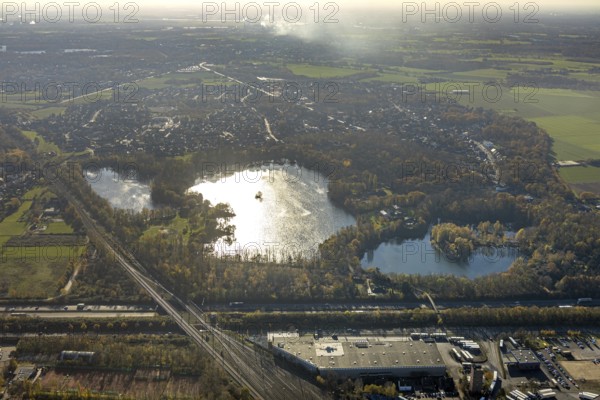 Aerial view, recreation area Schwafheim, mountain lake, Schwafheimer See, Moers-Schwafheim, Mörs, Ruhr area, North Rhine-Westphalia, Germany, DE, Europe, landscape conservation area, aerial view, aerial photography, aerial photography, Römerstraße, lake, overview, bird's-eye view, forest area, birds-eyes view, overview