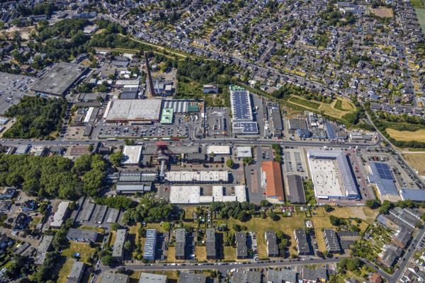 Aerial view, Former Rheinpreußen colliery, Franz-Haniel-Straße industrial estate, Hornbach DIY store, REAL supermarket, Mörs, Ruhr area, North Rhine-Westphalia, Germany, DE, Europe, birds-eyes, view, aerial photograph, aerial photography, aerial photography, overview, overview, bird's eye view, colliery, DIY store, hobby, construction, garden, construction supplies, tools, machines, industry, trade, business, commercial enterprise, production, trade, shopping, food