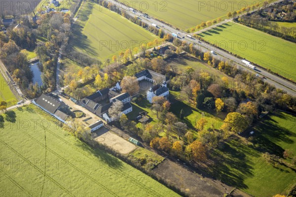 Aerial view, Lauersfort Castle, Kapellen-Holderberg, Mörs, Ruhr area, North Rhine-Westphalia, Germany, DE, monument protection, Europe, moat, autumn colours, manor house, manor building, Lauersforter Straße, aerial view, aerial photography, aerial photography, park, park grounds, castle, castle grounds, castle garden, castle park, overview, bird's-eye view, moated castle, moated moat, moated castle, birds-eyes view, former manor, overview