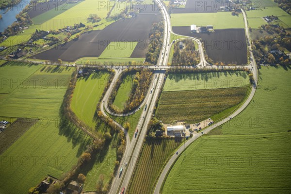 Aerial view, motorway A57, junction Moers-Kapellen, Kapellen-Achterathsheide, Mörs, Ruhr area, North Rhine-Westphalia, Germany, junction, DE, Europe, aerial view, aerial photography, aerial photography, overview, bird's-eye view, meadows and fields, birds-eyes view, overview