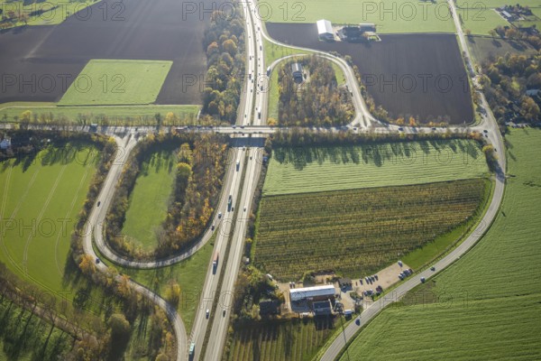 Aerial view, motorway A57, junction Moers-Kapellen, Kapellen-Achterathsheide, Mörs, Ruhr area, North Rhine-Westphalia, Germany, junction, DE, Europe, aerial view, aerial photography, aerial photography, overview, bird's-eye view, meadows and fields, birds-eyes view, overview