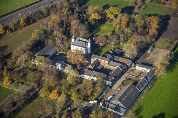 Aerial view, Lauersfort Castle, Kapellen-Holderberg, Mörs, Ruhr area, North Rhine-Westphalia, Germany, DE, monument protection, Europe, moat, autumn colours, manor house, manor building, Lauersforter Straße, aerial view, aerial photography, aerial photography, park, park grounds, castle, castle grounds, castle garden, castle park, overview, bird's eye view, moated castle, moated moat, moated castle, birds-eyes view, former manor, overview