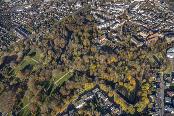 Aerial view, Mörs Castle Park, Mörs Castle, St. Joseph's Catholic Church, Employment Agency, Mörs, Ruhr area, North Rhine-Westphalia, Germany, DE, Europe, Grafschafter Museum, green trees, Hanckwitzstraße, autumn colours, manor house, manor building, fort, aerial photograph, aerial photography, aerial photography, park, rose garden, castle, castle grounds, castle garden, castle park, overview, bird's-eye view, wooded area, birds-eyes view, overview