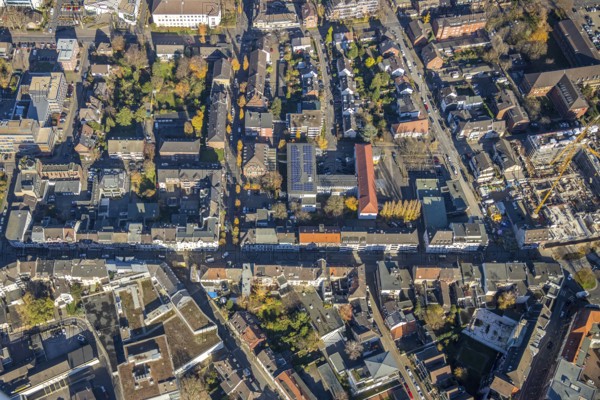 Aerial view, city centre view, roundabout Homberger Straße to Neuer Wall, Königlicher Hof, Mörs, Ruhr area, North Rhine-Westphalia, Germany, education, educational institution, DE, Europe, GGM, Grafschafter Gymnasium Mörs, grammar school, teaching institute, aerial view, aerial photography, aerial photography, photovoltaics, photovoltaic system, school, solar, solar system, solar energy, solar energy, overview, bird's-eye view, bird's-eye view, overview