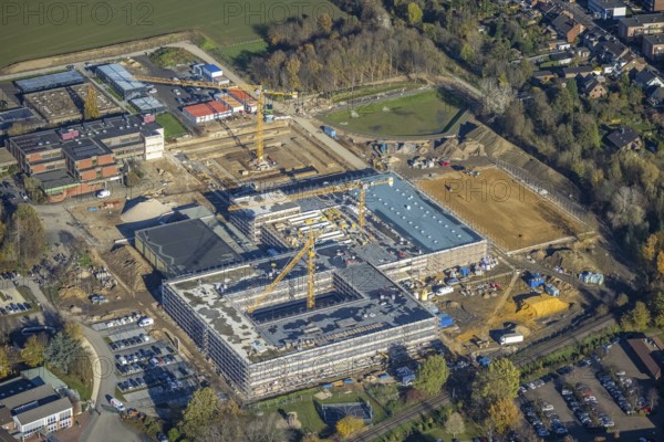 Aerial view, construction site, new school building, vocational college campus for technology Mörs, Mörs, Ruhr area, North Rhine-Westphalia, Germany, construction work, construction, construction area, building site, building plots, construction project, construction site, vocational school, education, educational institution, DE, Europe, educational institute, aerial photograph, aerial photography, aerial photography, new building, Repelener Straße, school, overview, bird's eye view, bird's eye view, overview