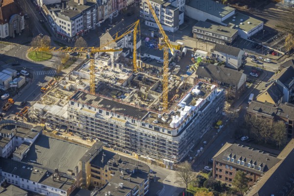 Aerial view, construction site new building Homberger Höfe, flats and commercial areas, formerly Horten, Mörs, Ruhr area, North Rhine-Westphalia, Germany, construction work, construction, construction area, construction site, building plots, construction crane, construction project, construction site, DE, Europe, commercial buildings, property tax, Homberger Straße, real estate, aerial view, aerial photography, aerial photography, new building, overview, bird's eye view, residential complex, living and living, residential area, residential buildings, birds-eyes view, overview