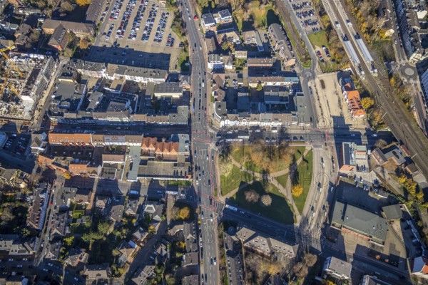 Aerial view, Mörs station, Klever Straße, Mörs, Ruhr area, North Rhine-Westphalia, Germany, railway tracks, station, station forecourt, construction crane, DE, Deutsche Bahn AG, Europe, Friedrich-Ebert-Platz, commercial buildings, property tax, main station, real estate, aerial view, aerial photography, aerial photography, overview, bird's-eye view, residential area, living and living, residential area, residential buildings, birds-eyes view, overview