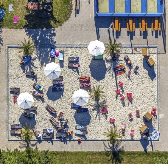 Aerial view, adventure pool, Aqua Spa and Aqua Fun Soest, outdoor pool, bathers, Soest, Soester Börde, North Rhine-Westphalia, Germany, DE, Europe, birds-eyes view, aerial view, aerial photography, aerial photography, overview, overview, bird's eye view, corona distance, keeping distance, swimming pool with Suan, sauna park, swimming pool, swimmer, blue water, sunbathing lawn, parasols