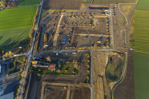 Aerial view, construction area Neuer Soester Norden, new residential neighbourhood, Danziger Ring, Oestinghauser Landstraße, Soest, Soester Börde, North Rhine-Westphalia, Germany, construction work, building, construction area, building site, building plots, construction project, construction site, DE, Europe, commercial enterprises, commercial area, commercial area, commercial park, commercial location, commercial use, property tax, real estate, industrial area, industrial building, industrial location, aerial view, aerial photography, aerial photography, new construction, overview, bird's-eye view, residential area, residential area, residential buildings, residential quality, residential neighbourhood, housing estate, birds-eyes view, overview