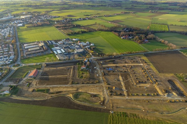 Aerial view, construction area Neuer Soester Norden, new residential neighbourhood, Danziger Ring, Oestinghauser Landstraße, Soest, Soester Börde, North Rhine-Westphalia, Germany, construction work, building, construction area, building site, building plots, construction project, construction site, DE, Europe, commercial enterprises, commercial area, commercial area, commercial park, commercial location, commercial use, property tax, real estate, industrial area, industrial building, industrial location, aerial view, aerial photography, aerial photography, new construction, overview, bird's-eye view, residential area, residential area, residential buildings, residential quality, residential neighbourhood, housing estate, birds-eyes view, overview