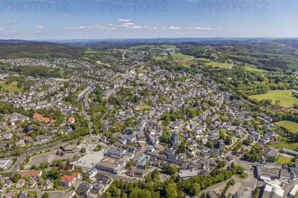 Aerial view, town view, town hall, construction site renovation Jesus-Christus-Kirche, Meinerzhagen, Märkischer Kreis, Sauerland, North Rhine-Westphalia, Germany, place of worship, city, DE, Europe, distant view, religious community, place of worship, hilly landscape, city centre, church, parish, denomination, roundabout, culture, art, aerial view, aerial photography, aerial photography, renovation, redevelopment, townscape, city area, city centre, overview, events, event location, event venue, event centre, bird's-eye view, residential area, birds-eyes view, cultural use, overview