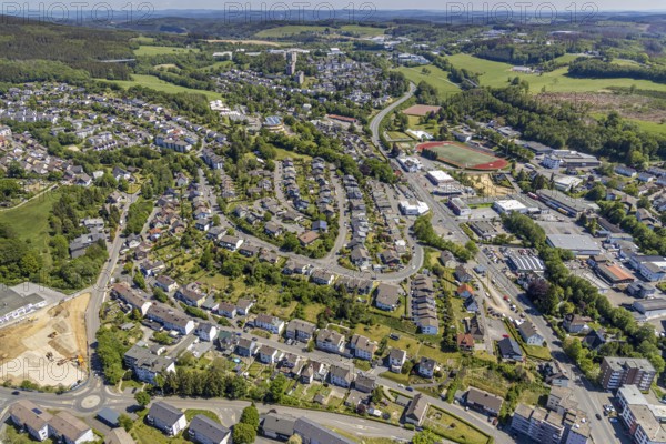 Aerial view, stadium, commercial area Oststraße, residential area Zum Rothenstein, school centre Rothenstein, Meinerzhagen, Märkischer Kreis, Sauerland, North Rhine-Westphalia, Germany, education, educational institution, DE, Europe, primary school Am Kohlberg, property tax, real estate, educational institute, aerial photograph, aerial photography, aerial photography, school, overview, bird's eye view, residential area, living and life, residential area, residential buildings, residential quality, housing estate, birds-eyes view, overview