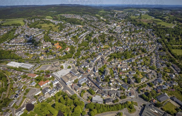 Aerial view, town view, town hall, construction site renovation Jesus-Christus-Kirche, Meinerzhagen, Märkischer Kreis, Sauerland, North Rhine-Westphalia, Germany, place of worship, city, DE, Europe, distant view, religious community, place of worship, hilly landscape, city centre, church, parish, denomination, roundabout, culture, art, aerial view, aerial photography, aerial photography, renovation, redevelopment, townscape, city area, city centre, overview, events, event location, event venue, event centre, bird's-eye view, residential area, birds-eyes view, cultural use, overview