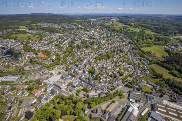 Aerial view, town view, town hall, construction site renovation Jesus-Christus-Kirche, Meinerzhagen, Märkischer Kreis, Sauerland, North Rhine-Westphalia, Germany, place of worship, city, DE, Europe, distant view, religious community, place of worship, hilly landscape, city centre, church, parish, denomination, roundabout, culture, art, aerial view, aerial photography, aerial photography, renovation, redevelopment, townscape, city area, city centre, overview, events, event location, event venue, event centre, bird's-eye view, residential area, birds-eyes view, cultural use, overview