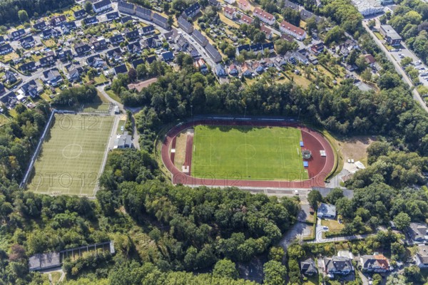 Aerial view, sports field, Huckenohl stadium, Menden, Sauerland, Märkischer Kreis, North Rhine-Westphalia, Germany, DE, Europe, football field, football stadium, Catholic kindergarten Heilig Kreuz, kindergarten, nursery, crèche, day nursery, day care centre, day care centre, athletics stadium, aerial view, aerial photography, aerial photography, Oesberner Weg, sports, sports facilities, sports facility, stadium, overview, bird's eye view, birds-eyes view, overview