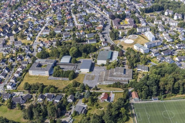 Aerial view, former school centre Bieberberg, sports hall Am Habicht, old secondary school Lendringsen, old secondary school Lendringsen, sports field, Menden, Sauerland, Märkischer Kreis, North Rhine-Westphalia, Germany, DE, Europe, football pitch, football stadium, aerial view, aerial photography, aerial photography, school, sports, sports facilities, sports facility, overview, bird's-eye view, former schools, overview, decommissioned, dilapidated, destroyed building