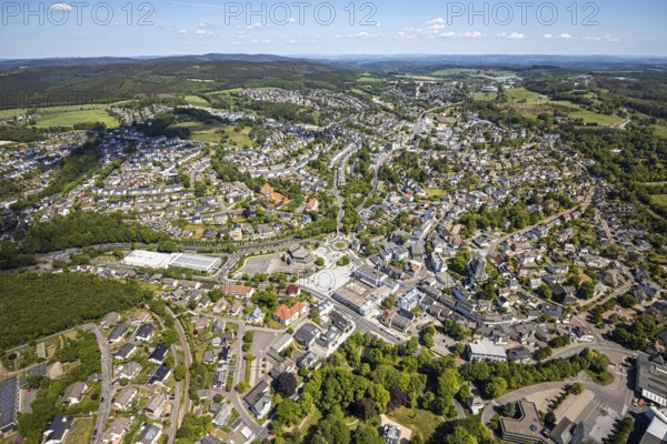 Aerial view, town view, Meinerzhagen town hall, Wilhelm-Langemann-Haus nursing home, tennis facility Tennis-Club Grün-Weiß, music school Volmetal, Meinerzhagen, Märkischer Kreis, Sauerland, North Rhine-Westphalia, Germany, City, DE, Europe, distant view, hilly landscape, city centre, aerial view, aerial photography, aerial photography, townscape, city area, city centre, overview, bird's eye view, birds-eyes view, overview