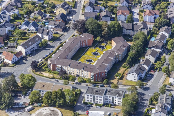 Aerial view, residential complex with green parking roof, inner courtyard, Clemens-Brentano-Straße, Menden, Sauerland, Märkischer Kreis, North Rhine-Westphalia, Germany, DE, Europe, shapes and colours, property tax, real estate, aerial view, aerial photography, aerial photography, parking roof, overview, bird's-eye view, residential complex, living and living, residential area, residential buildings, quality of life, residential quarter, housing estate, green inner courtyard, bird's-eye view, overview