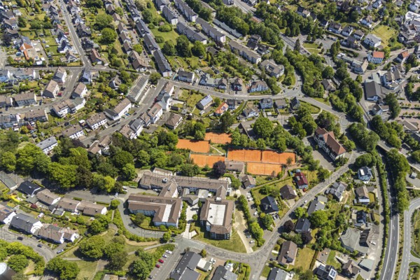 Aerial view, Wilhelm-Langemann-Haus nursing home, tennis facility Tennis-Club Grün-Weiß, music school Volmetal, Meinerzhagen, Märkischer Kreis, Sauerland, North Rhine-Westphalia, Germany, care and nursing, DE, Europe, green trees, roundabout, aerial view, aerial photography, aerial photography, music school, care facility, Meinerzhagen town hall, tennis, tennis facility, tennis courts, tennis club, overview, bird's eye view, living and life, birds-eyes view, overview