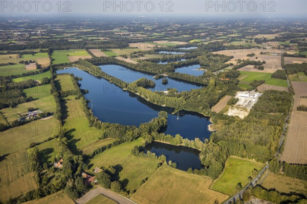 Aerial view, Alberssee, Rebbeke, Lippstadt, Kreis Soest, North Rhine-Westphalia, Germany, bathing lake, DE, Europe, leisure, leisure facility, leisure area, leisure pool, leisure activities, leisure enjoyment, Kreis-Soest-Buch, KreisSoestBuch, aerial photograph, aerial photography, aerial photography, lake, overview, bird's-eye view, birds-eyes view, overview