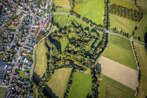 Aerial view, Lipperode Castle, in the forest, Lipperode, Lippstadt, Soest district, North Rhine-Westphalia, Germany, castle, castle remains of a moated castle, castle ruins, DE, Europe, Kreis-Soest-Buch, KreisSoestBuch, aerial photograph, aerial photography, aerial photography, park, park area, overview, bird's eye view, forest area, Zum Amt, birds-eyes view, overview