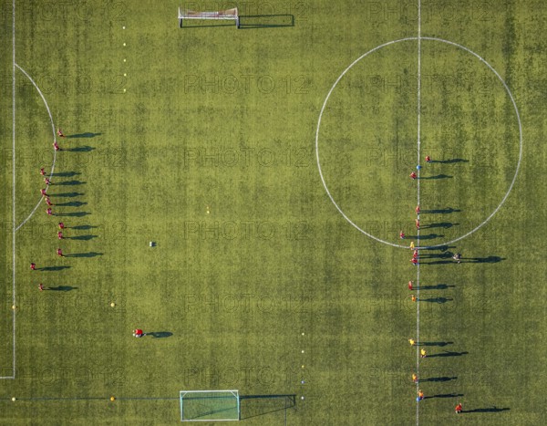 Aerial view, sports facility, SV Lippstadt 08 stadium, Liebelt-Arena, football players training, Lippstadt, Soest district, North Rhine-Westphalia, Germany, distance rule, arena, corona measures, corona virus, DE, Europe, shapes and colours, football field, football pitch, football stadium, football club, hygiene measures, Kreis-Soest-Buch, KreisSoestBuch, aerial view, aerial photography, aerial photography, shadow casting, sports, sports facilities, sports field, sports facility, stadium, Stadion Am Bruchbaum, overview, bird's-eye view, Wiedenbrücker Straße, birds-eyes view, overview