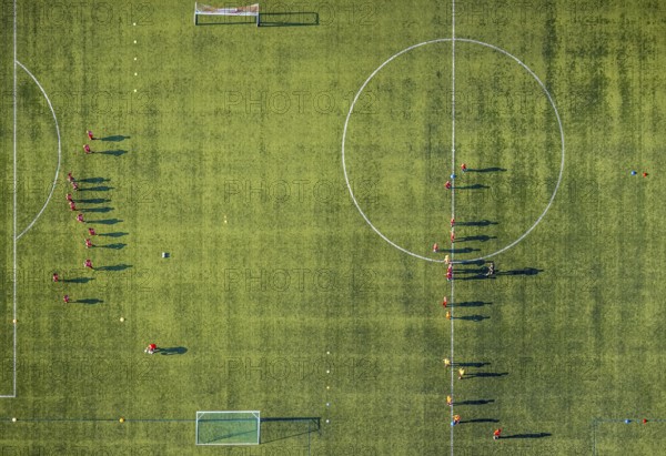 Aerial view, sports facility, SV Lippstadt 08 stadium, Liebelt-Arena, football players training, Lippstadt, Soest district, North Rhine-Westphalia, Germany, distance rule, arena, corona measures, corona virus, DE, Europe, shapes and colours, football field, football pitch, football stadium, football club, hygiene measures, Kreis-Soest-Buch, KreisSoestBuch, aerial view, aerial photography, aerial photography, shadow casting, sports, sports facilities, sports field, sports facility, stadium, Stadion Am Bruchbaum, overview, bird's-eye view, Wiedenbrücker Straße, birds-eyes view, overview