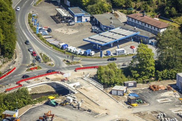 Aerial view, Aral petrol station, intersection of B54 and B229, construction site entrance to local supply centre, Brügge, Lüdenscheid, Märkischer Kreis, Sauerland, North Rhine-Westphalia, Germany, construction work, construction area, construction site, building site, construction project, construction site, DE, Europe, aerial view, aerial photography, aerial photography, overview, bird's-eye view, bird's-eye view, overview