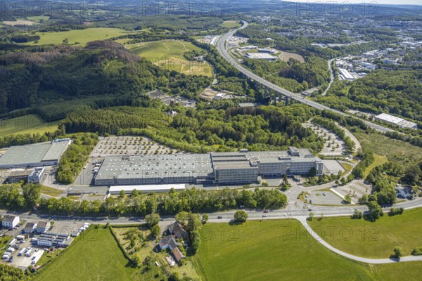 Aerial view, Leopold Kostal GmbH & Co. KG, An der Bellmerei, motorway A45, Lüdenscheid, Märkischer Kreis, Sauerland, North Rhine-Westphalia, Germany, motorway, DE, Europe, distant view, commercial area, commercial use, industrial plants, industrial area, industrial site, Kostal, aerial photograph, aerial photography, aerial photography, car parks, production plants, production halls, overview, traffic, bird's-eye view, forest area, birds-eyes view, overview