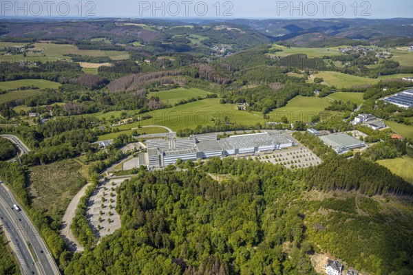 Aerial view, Leopold Kostal GmbH & Co. KG, An der Bellmerei, Lüdenscheid, Märkischer Kreis, Sauerland, North Rhine-Westphalia, Germany, motorway, motorway A45, DE, Europe, distant view, commercial area, commercial use, industrial plants, industrial area, industrial site, Kostal, aerial view, aerial photography, aerial photography, car parks, production plants, production halls, overview, traffic, bird's-eye view, forest area, birds-eyes view, overview