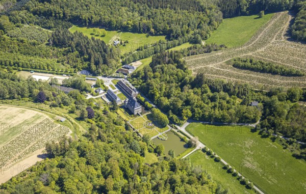 Aerial view, Neuenhof Castle, castle garden, Elspetal, Lüdenscheid, Märkischer Kreis, Sauerland, North Rhine-Westphalia, Germany, architectural monument, castle courtyard, DE, Europe, manor house, manorial building, courtyard complex, aerial photograph, aerial photography, Neuenhofer Straße, castle, castle complex, castle park, overview, bird's-eye view, wooded area, moated castle, moated castle, bird's-eye view, overview