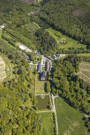 Aerial view, Neuenhof Castle, castle garden, Elspetal, Lüdenscheid, Märkischer Kreis, Sauerland, North Rhine-Westphalia, Germany, architectural monument, castle courtyard, DE, Europe, manor house, manorial building, courtyard complex, aerial photograph, aerial photography, Neuenhofer Straße, castle, castle complex, castle park, overview, bird's-eye view, wooded area, moated castle, moated castle, bird's-eye view, overview
