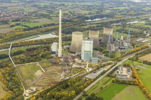 Aerial photo, thousands of spectators watched with great interest as the Gersteinwerk chimney was blown up half an hour late. The 282 metre high RWE chimney fell exactly into the prepared gravel bed. City limits of Werne, Hamm North Rhine-Westphalia, Germany